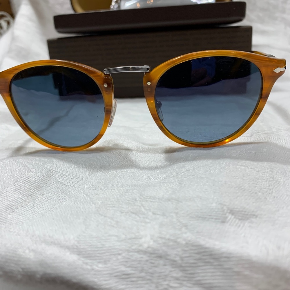 Person typewriter edition sunglasses